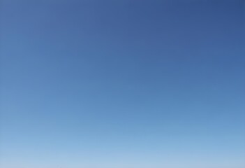 Clear blue sky, no clouds, among spoiled tree branches in winter time, cold, deep light blue, no people