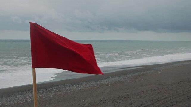 A red flag. The ban on bathing. Big waves. The danger of swimming