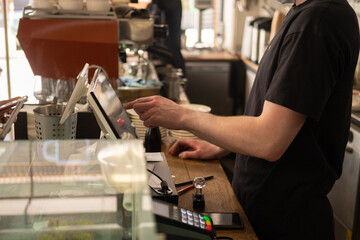 Barista faceless make coffee latte art with espresso machine in cafe . 