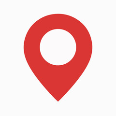 A red location pin icon, commonly used in maps and navigation applications. The pin is designed with a triangular shape pointing downwards, and it has a circular hole in the top center.