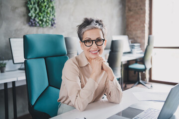 Photo of attractive good mood age lady recruiter dressed formal shirt smiling working indoors...