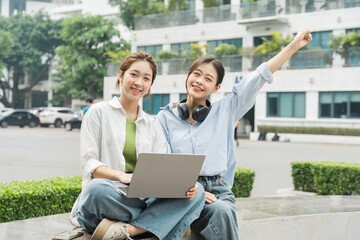 Portrait image of a group of Asian students at university.