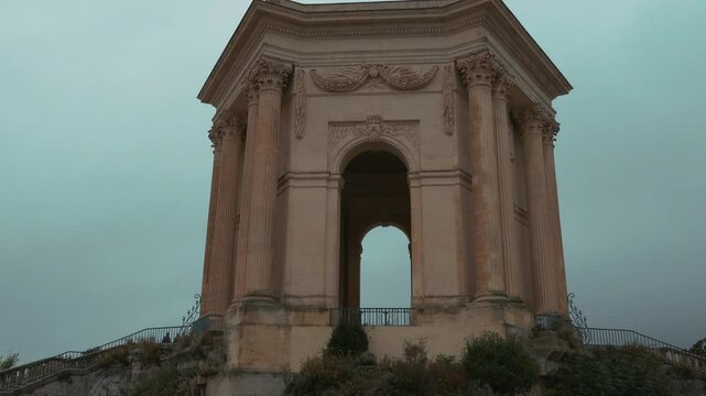 Ch&acirc;teau d&rsquo;eau du Peyrou at the Bassin principal du Peyrou. The water building and pond at the promenade du Peyrou - Montpellier, France