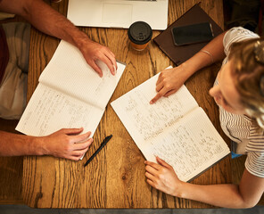 Naklejka premium Students, top and discussion with notebooks in cafe, study session and university notes for education with people. Learning, friends and exam or assessment preparation, assignment and collaboration