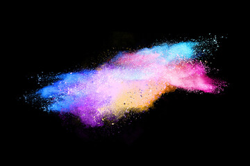 Abstract powder splatted background. colorful powder explosion on black background. Colored cloud. Colorful dust explode. Paint Holi