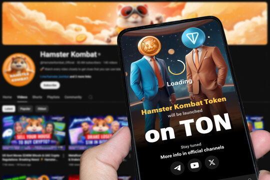 Viral Telegram-based Hamster Kombat crypto game for earn tokens on smartphone screen. London, UK, 28.06.2024	