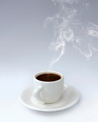 Cup of Aromatic Black Steaming Coffee