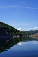 Nature reserve park Uvac river with beautiful mountains, green lush forest, clear sky with no clouds and blue water and bald eagles in south Serbia in the Balkans in Europe