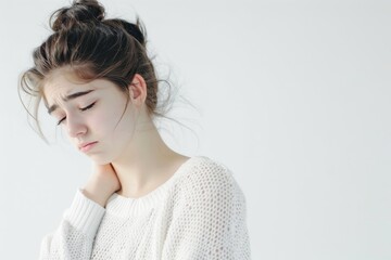Unwell Late Teenage Girl with Clear Light on White Background