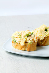 Russian salad appetizer with bread