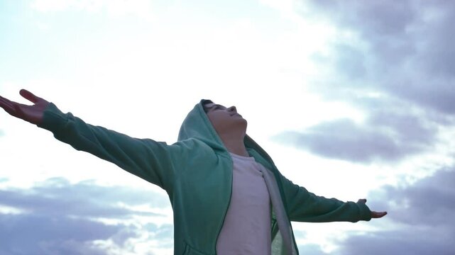 Sunlit Reverie: Boy Embracing Sunlight, Lost in Wonder as He Gazes Skyward