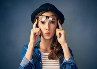 Portrait, thinking and woman with glasses for idea, vision and mindset isolated on studio...