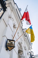 Polish and Ukrainian Flags on Historic Building