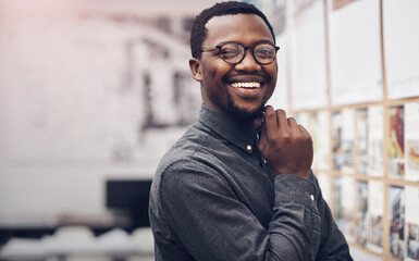 Smile, glasses and portrait of architect in office with information on pinboard at startup. Happy, pride and professional black man with career in architecture working on industrial design project.