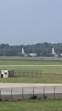 Military Airplanes Taxiing at Air Base for Mission