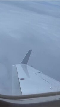Airplane Window View While Turning Sideways (private jet embraer phenom 300)