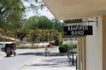Bagpiper Band sign at the La Martiniere college in Lucknow, Uttar Pradesh, India, Asia