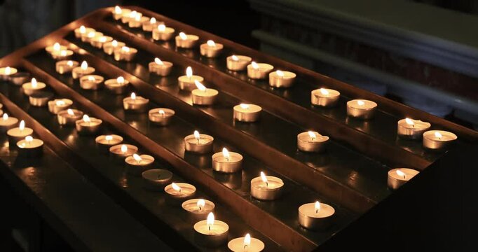 Cathedral of Civitavecchia Italy alter prayer candles. Ancient or old town developed by Roman occupation. Civitavecchia cruise and ferry port for Rome and The Vatican