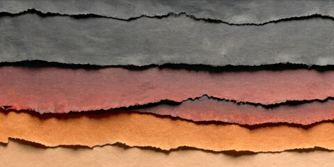 Fototapeta premium surface is multicolored crumpled torn paper with burnt edges