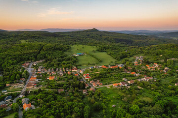 Naklejka premium Ruins of a medieval castle Somoska or Somoskoi var. on borders of southern Slovakia and Hungary at sunrise time.
