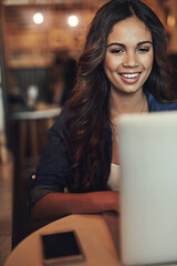 Woman, typing and laptop at night in cafe, copywriter and online research for article deadline. Female person, website and feature for project proposal, planning and diner for remote work in diner