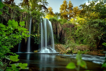 Naklejka premium The canyon formed by Antalya Duden waterfall is a popular destination for those who want to cool off in hot weather.