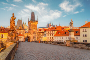 View of the city of Prague and the Vltava river with Old Town Bridge Tower on  Charles bridge  in Prague, Czech Republic.