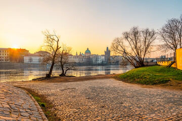 View of the city of Prague. Vltava river with Old Town Bridge Tower on  Charles bridge  in Prague,...