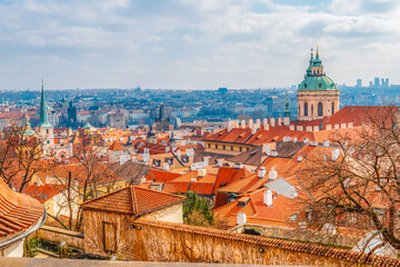 Fototapeta premium View of the city Prague and the Vltava river with Charles bridge from prague castle, hradcany in Prague, Czech Republic.