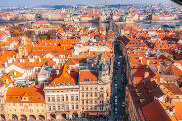 Obraz premium View of the city of Prague and the Vltava river from St Nicholas Church at Mala Strana (Kostel sv. Mikulase) in Prague, Czech Republic.