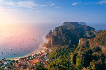 Amazing travel photo Thailand tropical paradise by drone. Aerial view sunset Phi Phi island, Krabi...