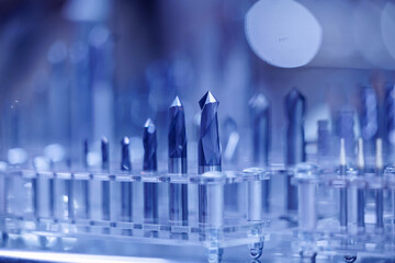 Industrial set drill bit for CNC machine cutting sheet metal, macro photo