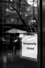 Temporarily Closed sign at the front door