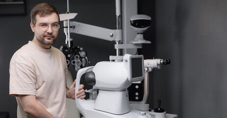 Ophthalmologist doctor use autorefractor slit lamp for diagnostic eye and optometry machine, optical examination tool in ophthalmology clinic
