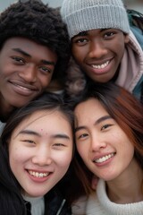Fototapeta premium Group of young adults smiling and standing side by side, perfect for social media or friendship themed projects