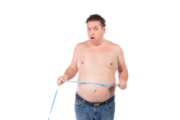 Fototapeta premium Funny fat man on a diet. Guy posing on a white background.
