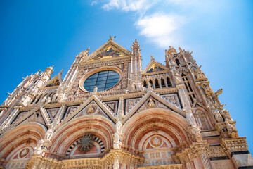 Siena, medieval town in Tuscany, with view of the Dome & Bell Tower of Siena Cathedral,  Mangia...