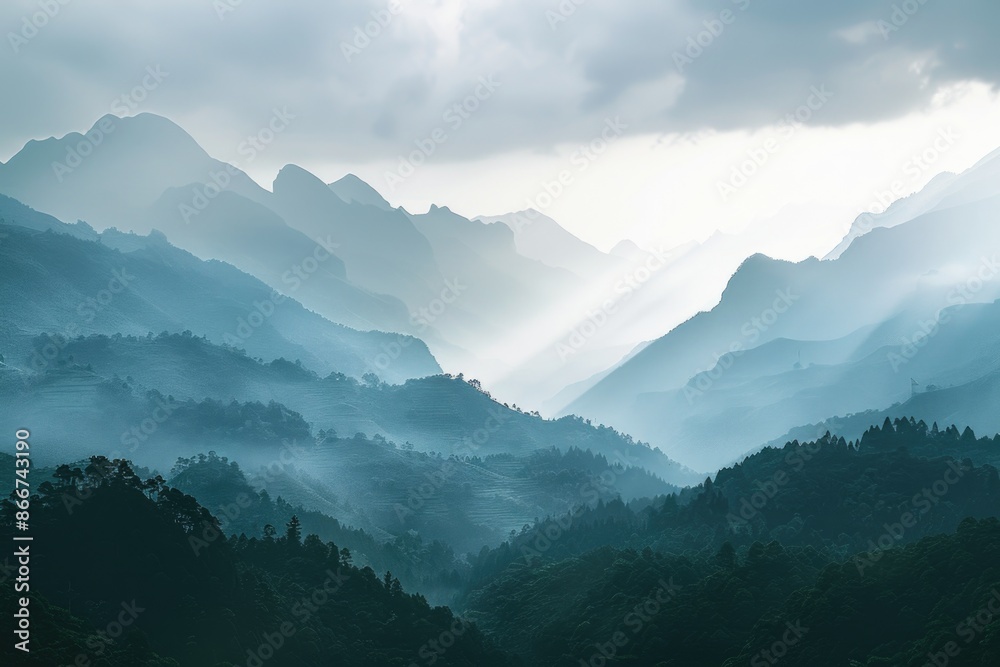 Poster a distant view of a mountain range with snow-capped peaks and lush valleys