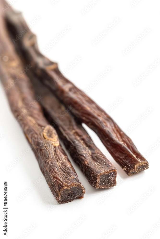 Poster a detailed view of various sticks arranged on a clean white surface