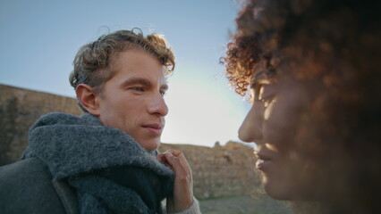 Young pair flirting evening coast closeup. Relaxed couple touching each other