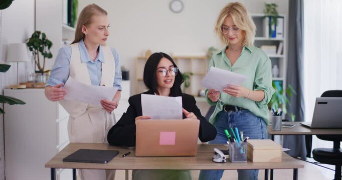Team Leader Delegates Tasks to Office Workers