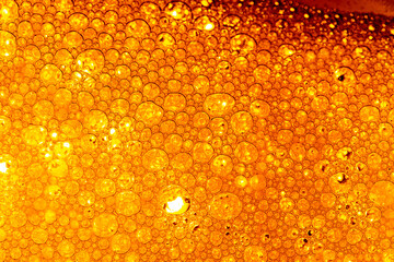 Yellow drink bubble texture close-up,Beer Background Ice Cold Pint With Water Drops Condensation,Golden yellow water drops. Nature collection. 