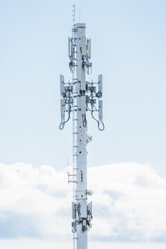 Cell phone tower standing tall for telecommunications with antenna in Alberta Canada.