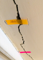 Monitoring wall cracks with date stickers