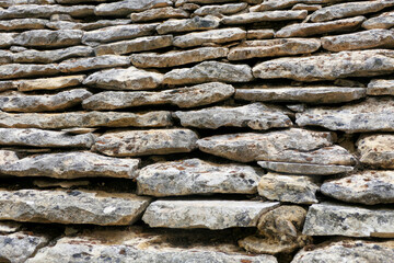 An example of ancient stone roof tiles found in the Dordogne, France. Also known as Lauze roof tiles.
