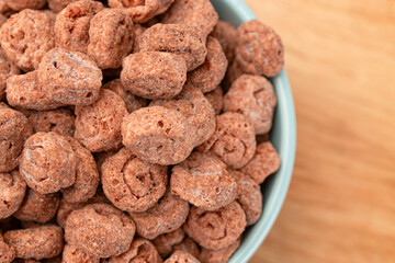Swiss Roll Flavored Breakfast Cereal on a Wood Kitchen Cabinet