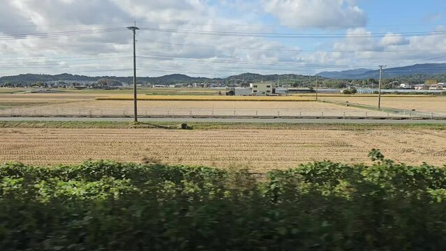 Scenery of suburb in Japan from JR express train window on the way to Hita station.