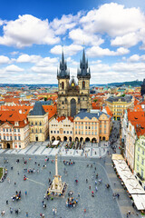 Obraz premium Elevated view over the old town square of Prague, Czech Republic, with the iconic Tyn Church during a sunny summer day