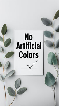 Modern minimalistic design featuring &ldquo;No Artificial Colors&rdquo; in black letters with a checkmark icon on a white background. Bright, clean setup with perfect white balance, emphasizing simplicity and cla
