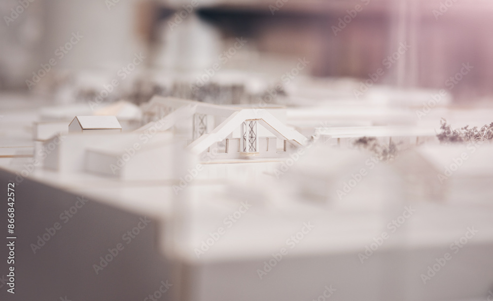 Poster architecture, building and model on desk in office for property, design or expansion for urban proje